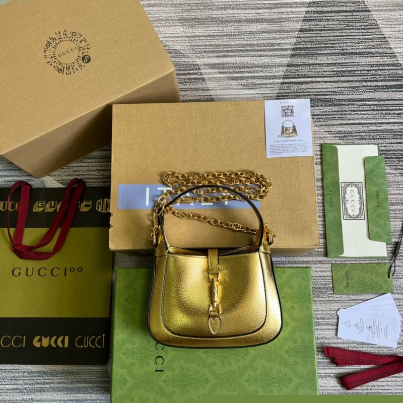 G*u*i top handle bags